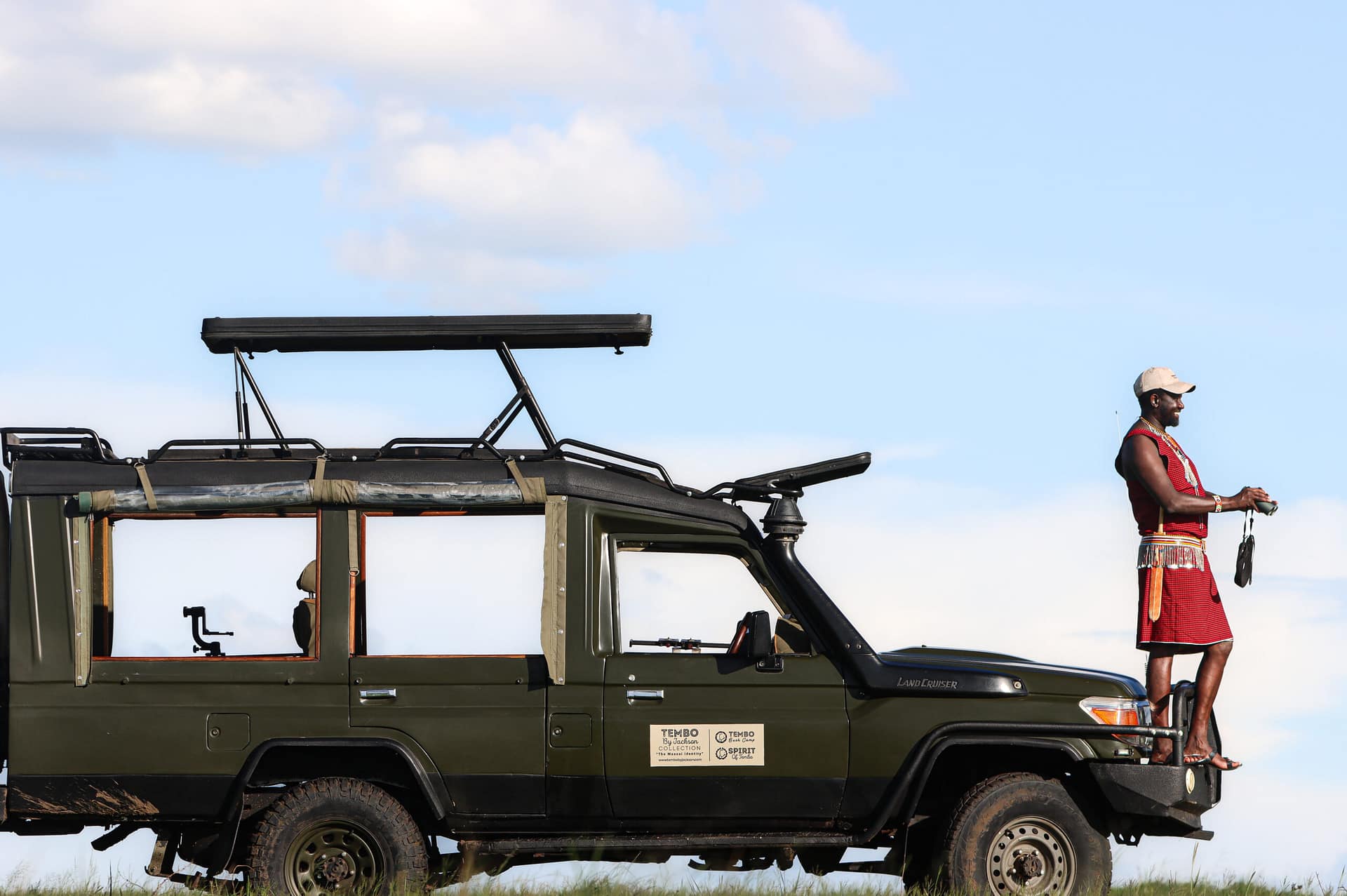 Jackson Naurori - Profile with Vehicle (Angle 3) - Tembo By Jackson Collection